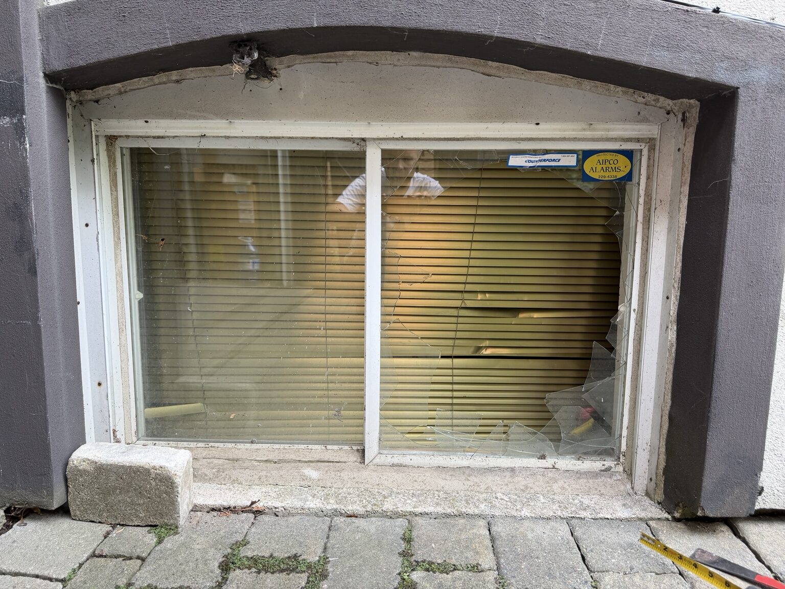 Etobicoke basement window glass broken before securing